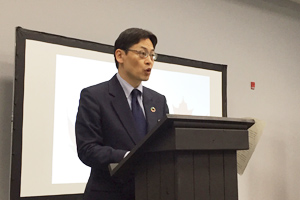 Photo of NEDO Executive Director Takashi Omote delivering remarks