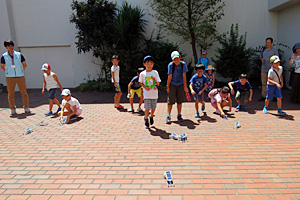 Children testing their cars outside