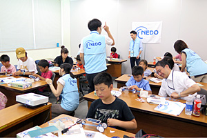 Children making solar-powered cars