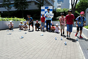 Children testing cars outside