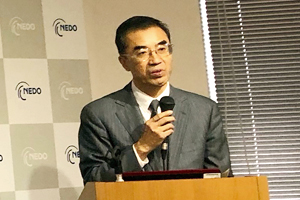 Photo of NEDO Executive Director Yoshiteru Sato giving opening remarks