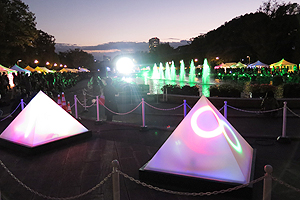 Photo of event venue illuminated at dusk