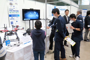 Photo of children at NEDO booth