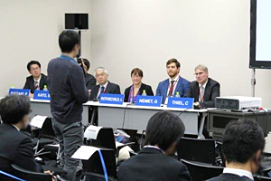 Photo of discussion between symposium panelists and audience