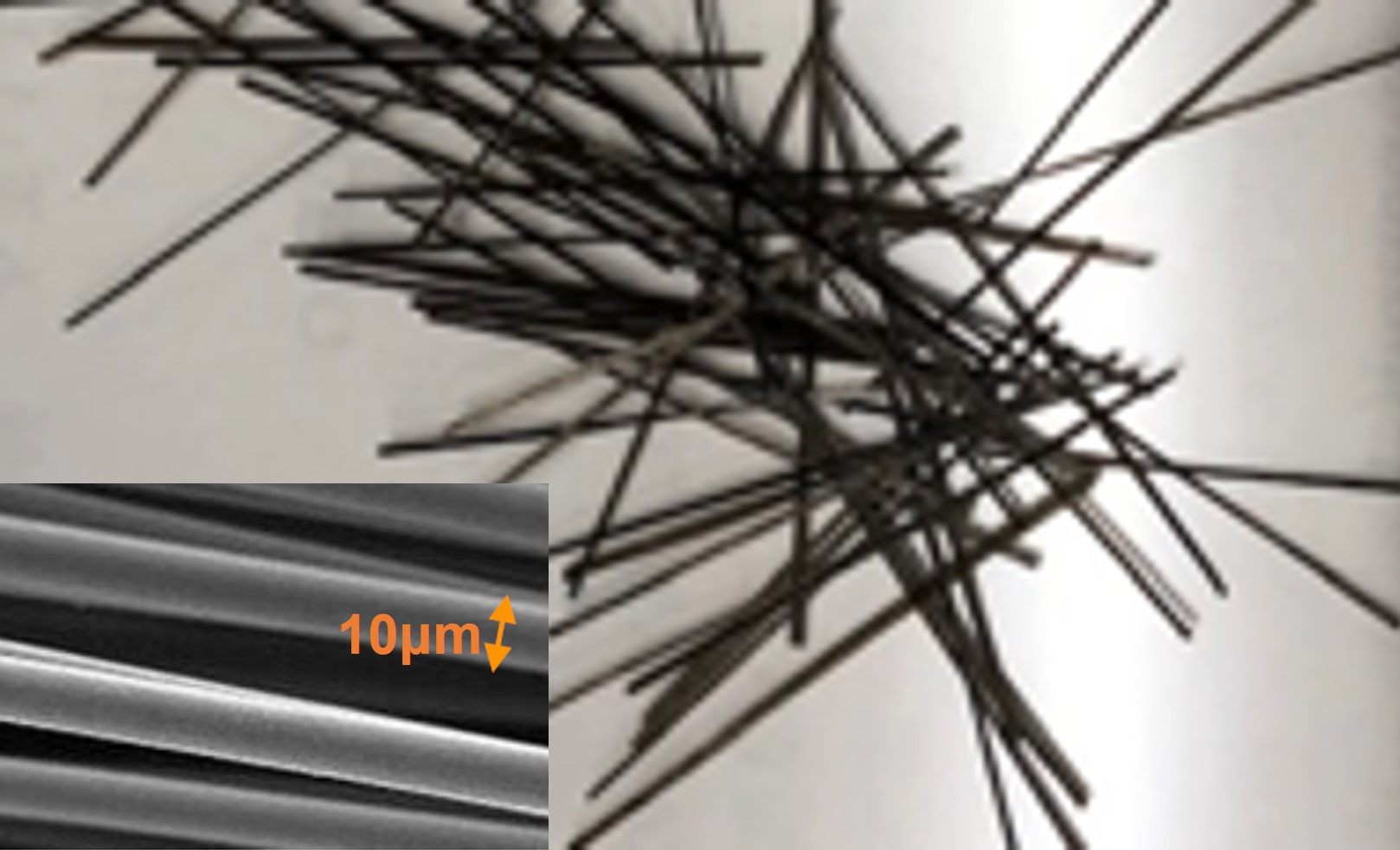 Short fibers for reinforcing concrete made from coal ash and magnified image of its long fibers