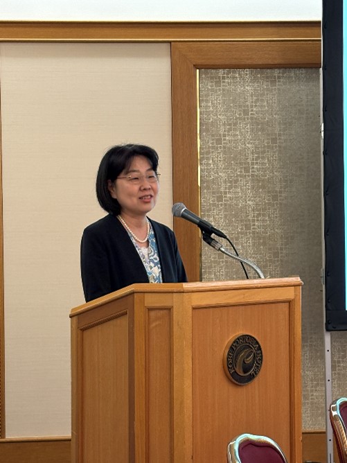 A photo of Dr. Iimura, Executive Director of NEDO,giving a greeting