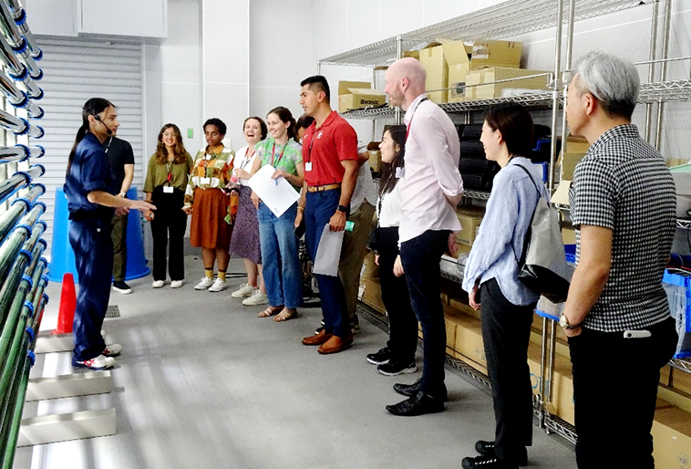 Picture of project participants introducing their R&D activities at each facility