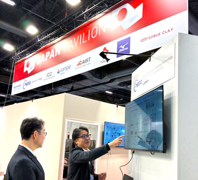 Photo of the NEDO booth set up in front of the Japan Pavilion